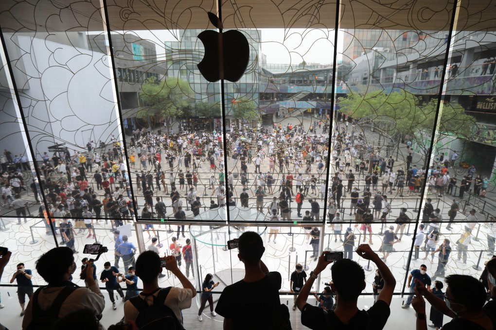 Apple fans line up to visit a new flagship store at Sanlitun in Beijing, China, on July 17, 2020. Photo: Simon Song