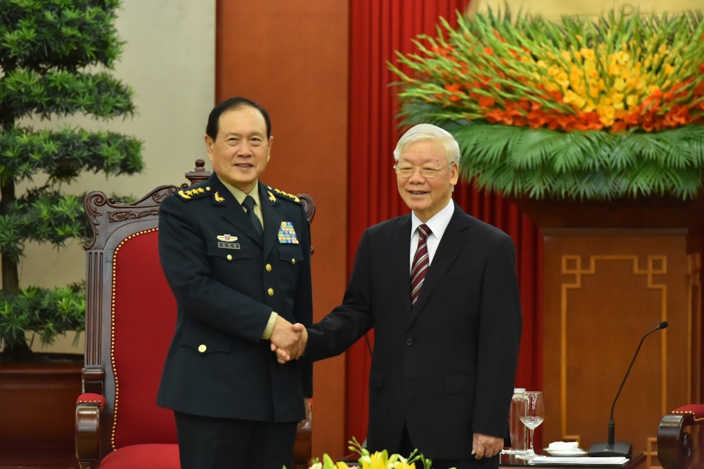 China’s Defence Minister Wei Fenghe (left) meets Vietnam’s Communist Party General Secretary Nguyen Phu Trong in Hanoi on Monday. Photo: Xinhua