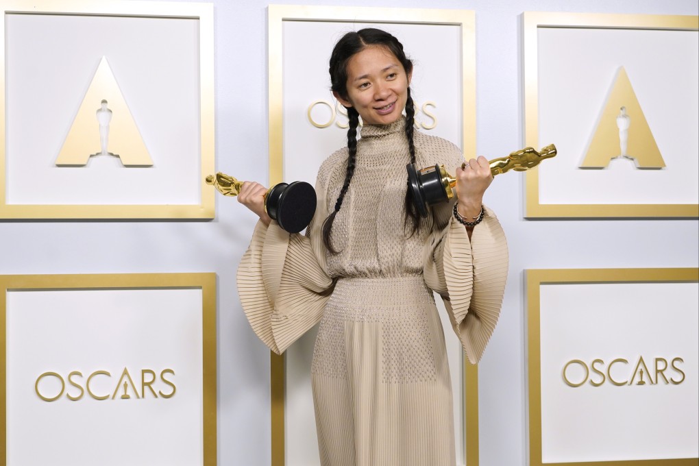 Chloe Zhao with her Academy Awards for best picture and best director for Nomadland. Photo: AP