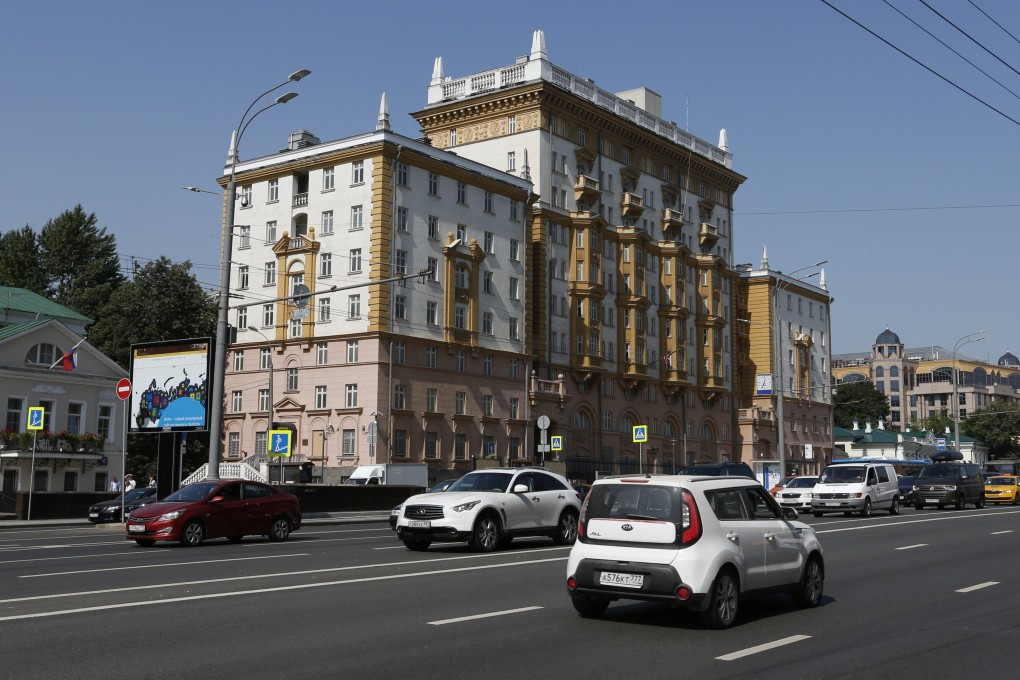 Vehicles drive past the US embassy in Moscow. File photo: Reuters