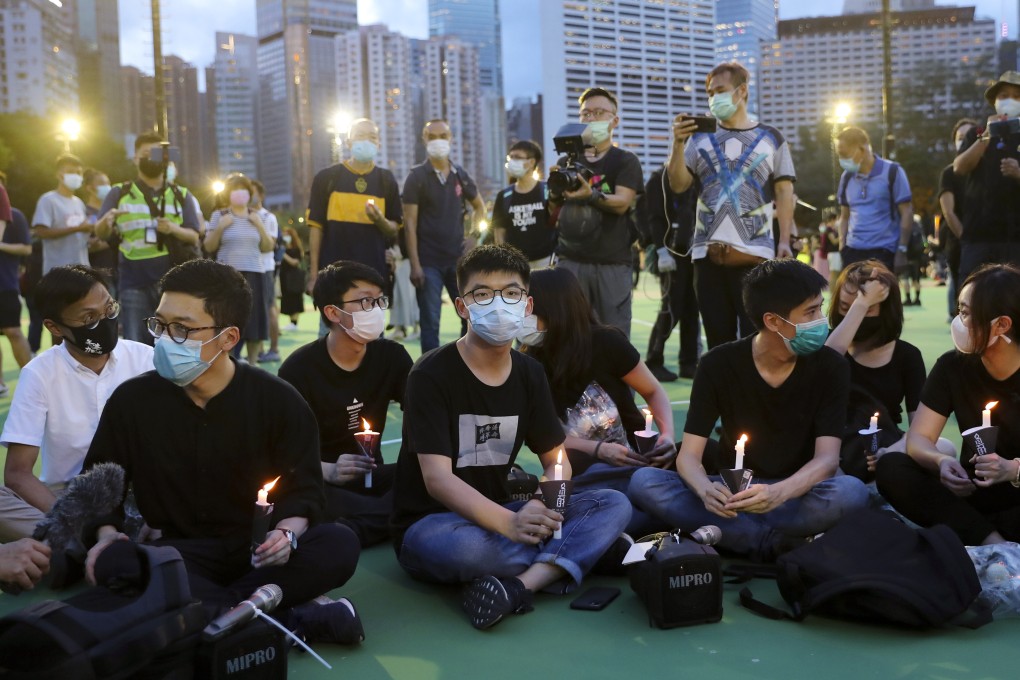 Hong Kong activist Joshua Wong (centre) pleaded guilty on Friday to taking part in a banned Tiananmen Square vigil on June 4, 2020. Photo: Sam Tsang