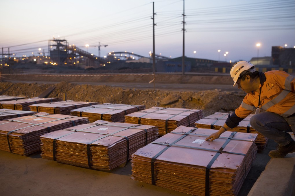 Batches of processed copper are inspected before shipping in the Democratic Republic of Congo. Photo: Getty Images