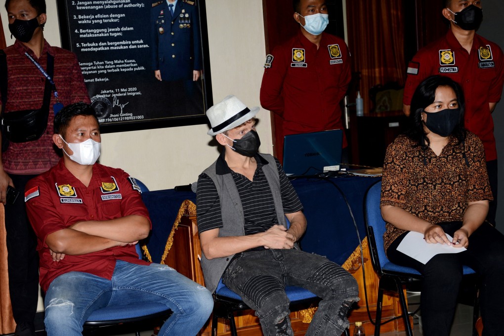 Christopher Kyle Martin of Canada at a press conference at the international airport in Bali where immigration authorities announced his expulsion for offering an orgasmic yoga class that was considered disrespectful to local values. Photo: AFP