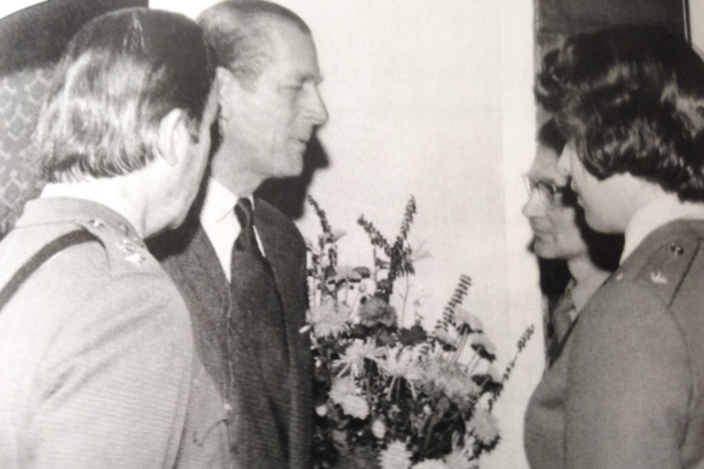 Prince Philip talks to Julia Kneale in 1976. Kneale became the first female vet in the British Army. Photo: Julia Kneale