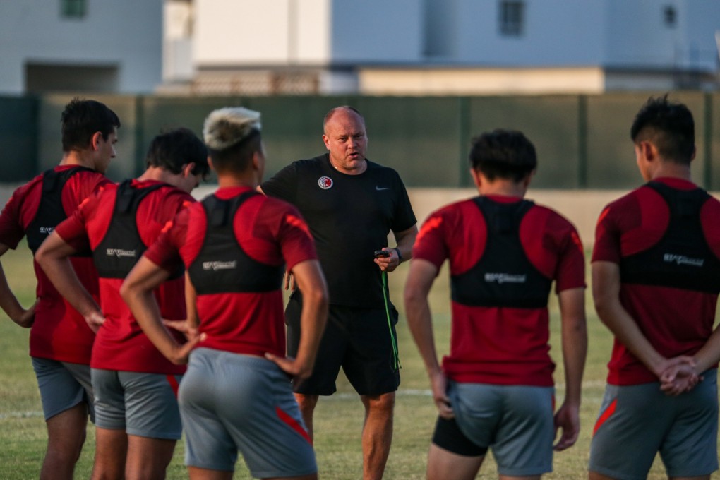 Hong Kong coach Mixu Paatelainen talks to his players during a training session. Photos: Handout