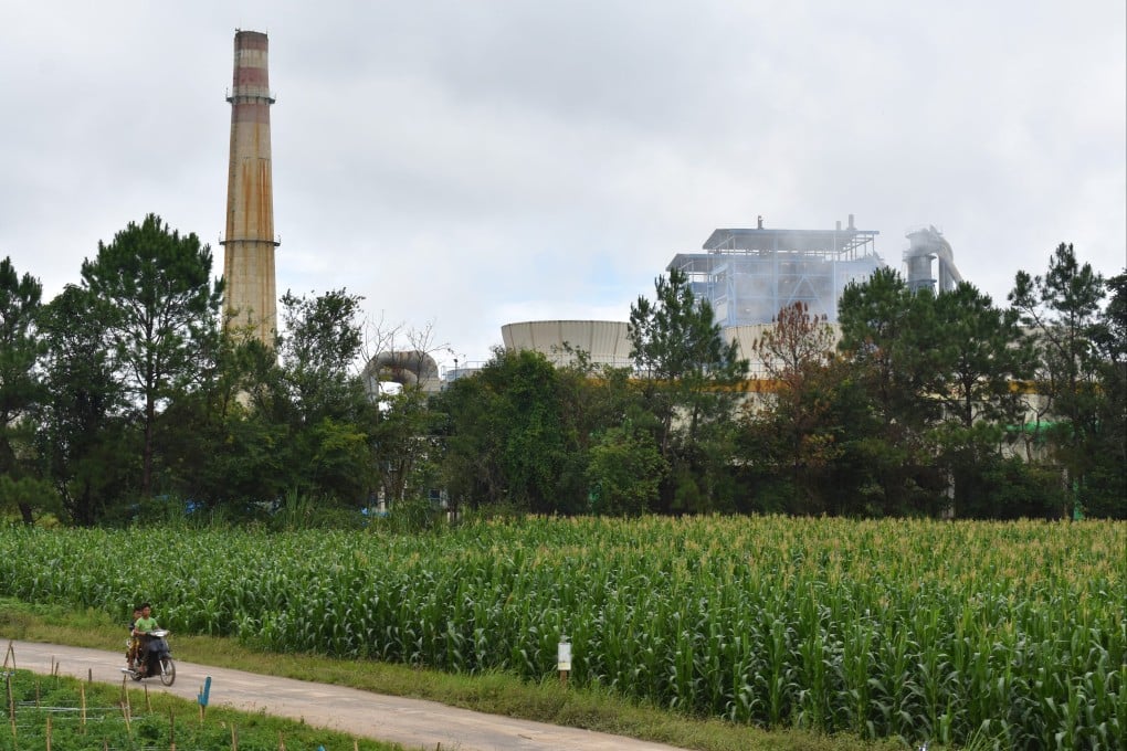The China -backed coal-fired power plant in Tigyit, in Myanmar’s Shan State, looms over cornfields. Photo: Robert Bociaga