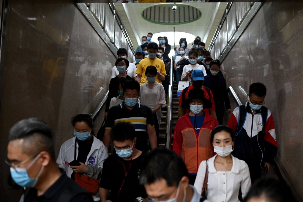 Subway commuters during rush hour in Beijing on June 2. Ground down by the sapping realities of modern city life, China’s youth are “lying flat”, the latest buzzword for those tapping out of a culture of endless work with little reward. Photo: AFP