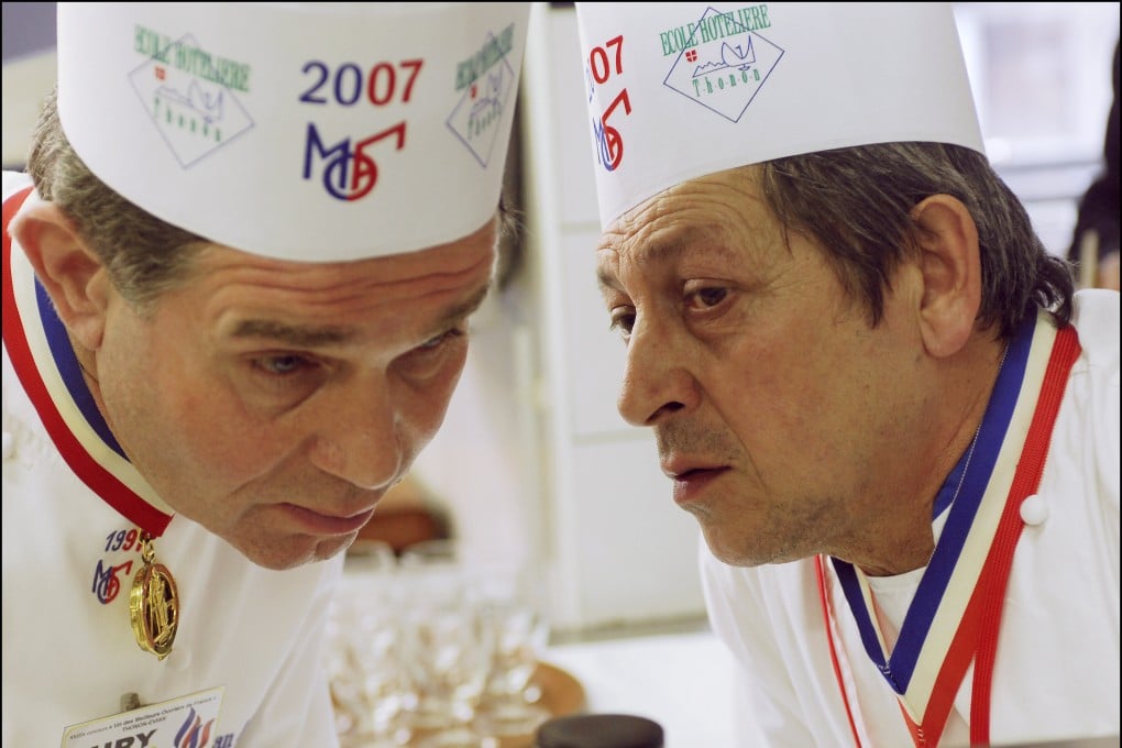 Jacques Maximin (right) speaks with Jean-Marc Delatour during the World Best Chefs competition in Thonon-Les-Bains, France in 2007. Photo: Getty Images