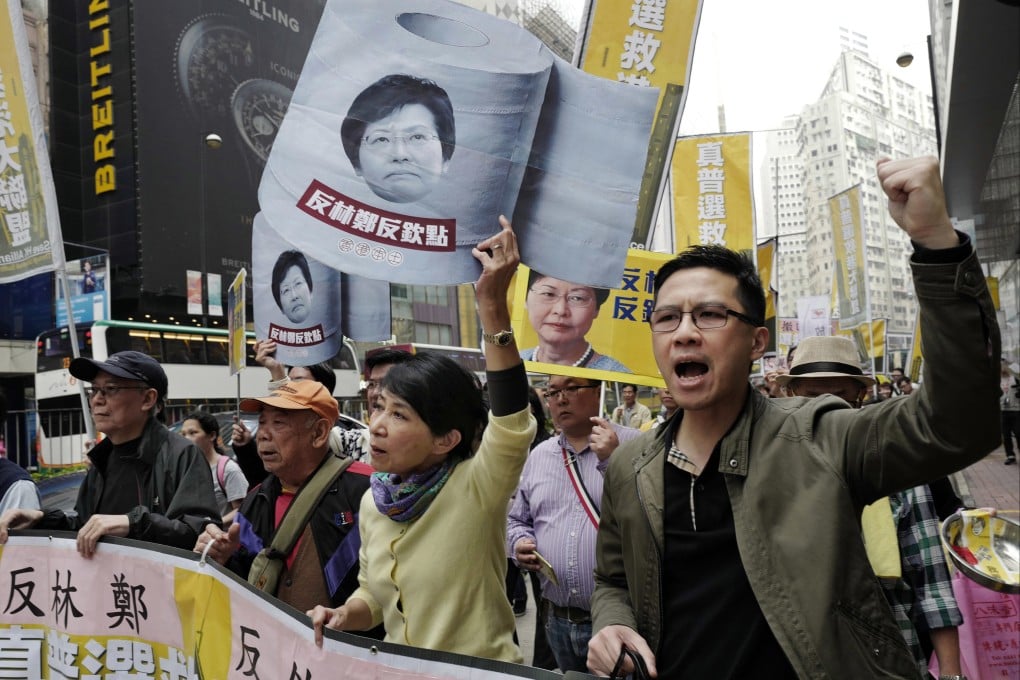 Protesters are seen during a rally against Hong Kong’s former Chief Secretary Carrie Lam in Hong Kong, in February 2017. Photo: AP