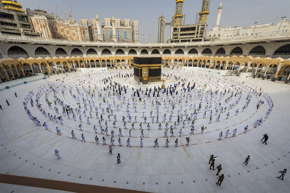 Pilgrims walk around the Kabba at the Grand Mosque in the Muslim holy city of Mecca, Saudi Arabia, in July 2020. This year’s pilgrimage will be limited to no more than 60,000 people, all of them from within the kingdom. Photo: AP