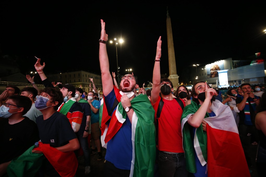 Spectators in Rome watch the Uefa Euro 2020 football match between Italy and Turkey on Friday. Photo: LaPresse via ZUMA Press/dpa