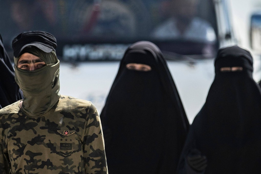 Women, reportedly wives of Islamic State fighters, in the al-Hol camp in  northeastern Syria. Photo: AFP