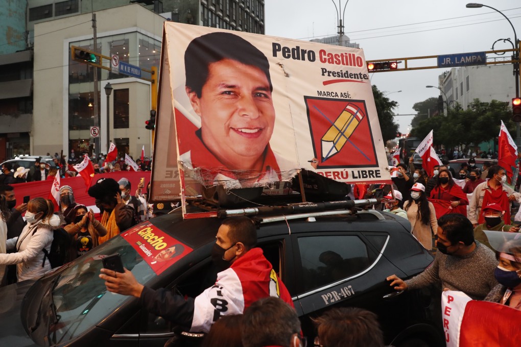 Supporters of presidential candidate Pedro Castillo carry a board bearing his image in Lima. Photo: EPA-EFE