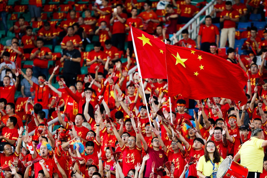 Chinese football fans cheer on the team in a Fifa World Cup 2018 qualifier against Uzbekistan in Wuhan in 2017. Photo: Reuters