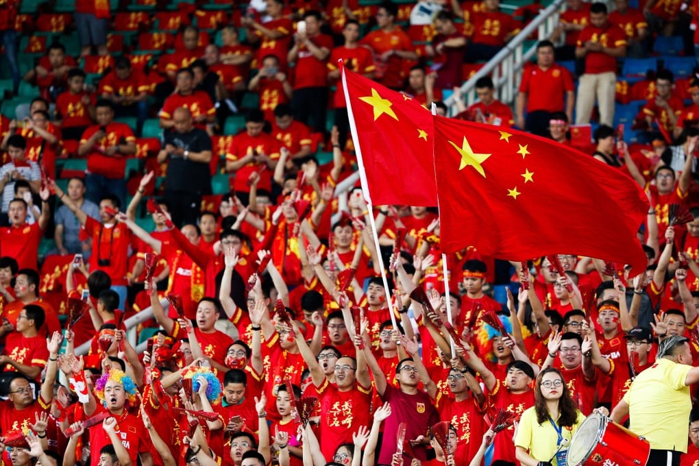 Chinese football fans cheer on the team in a Fifa World Cup 2018 qualifier against Uzbekistan in Wuhan in 2017. Photo: Reuters