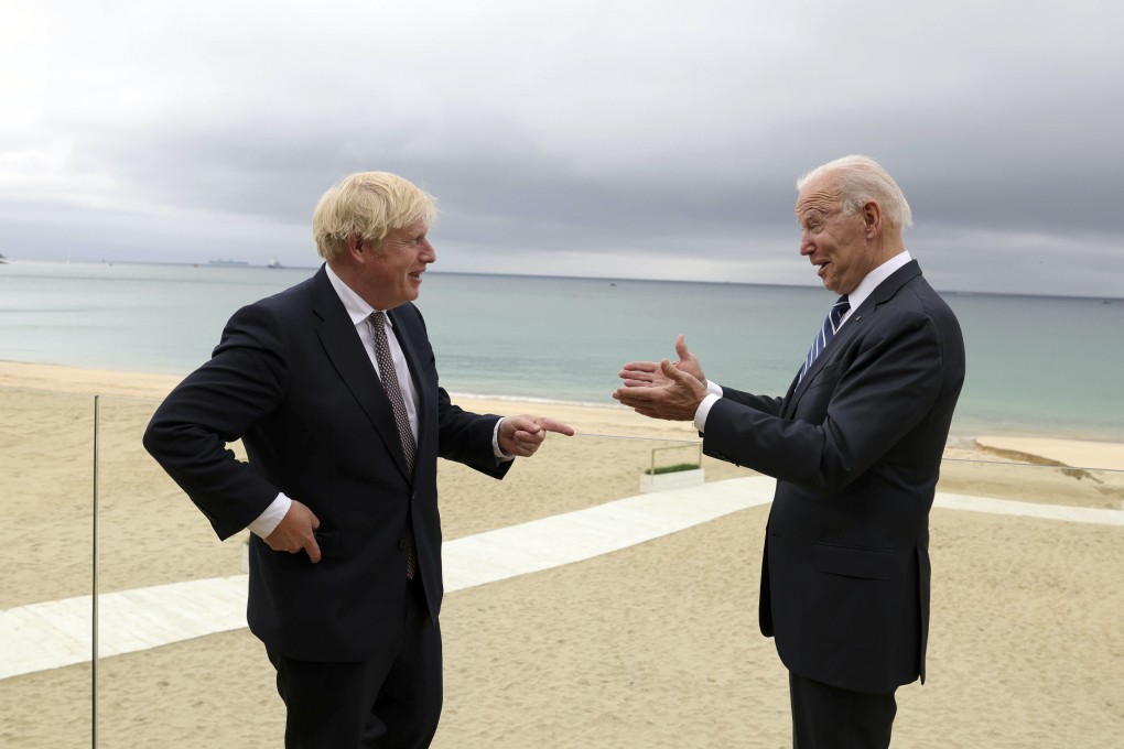 British Prime Minister Boris Johnson shares a light moment with US President Joe Biden in Carbis Bay, Cornwall, Britain, on June 10. The two on Thursday agreed to work to resume travel between the two countries and signed a new Atlantic Charter. Photo: Handout via Xinhua