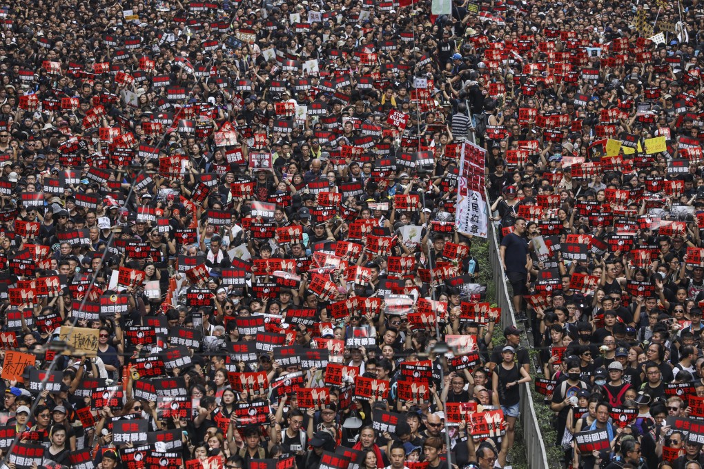 Protesters flood Causeway Bay during a massive march on June 16, 2019 against the government’s handling of a proposal to amend the extradition laws. Sam Tsang