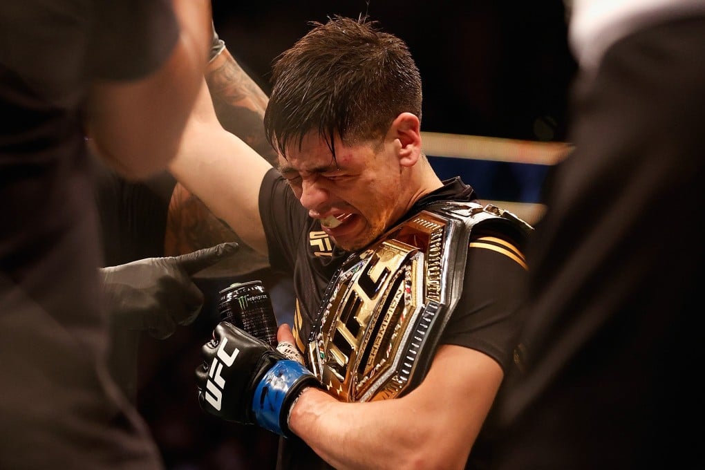 UFC flyweight champion Brandon Moreno of Mexico celebrates after defeating Deiveson Figueiredo at UFC 263. Photo: AFP