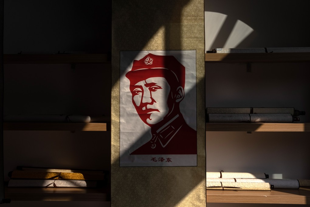 A portrait of Mao Zedong is seen at red-themed pedestrian street in Yanan in Shaanxi province ahead of the Communist Party centenary. Photo: EPA-EFE