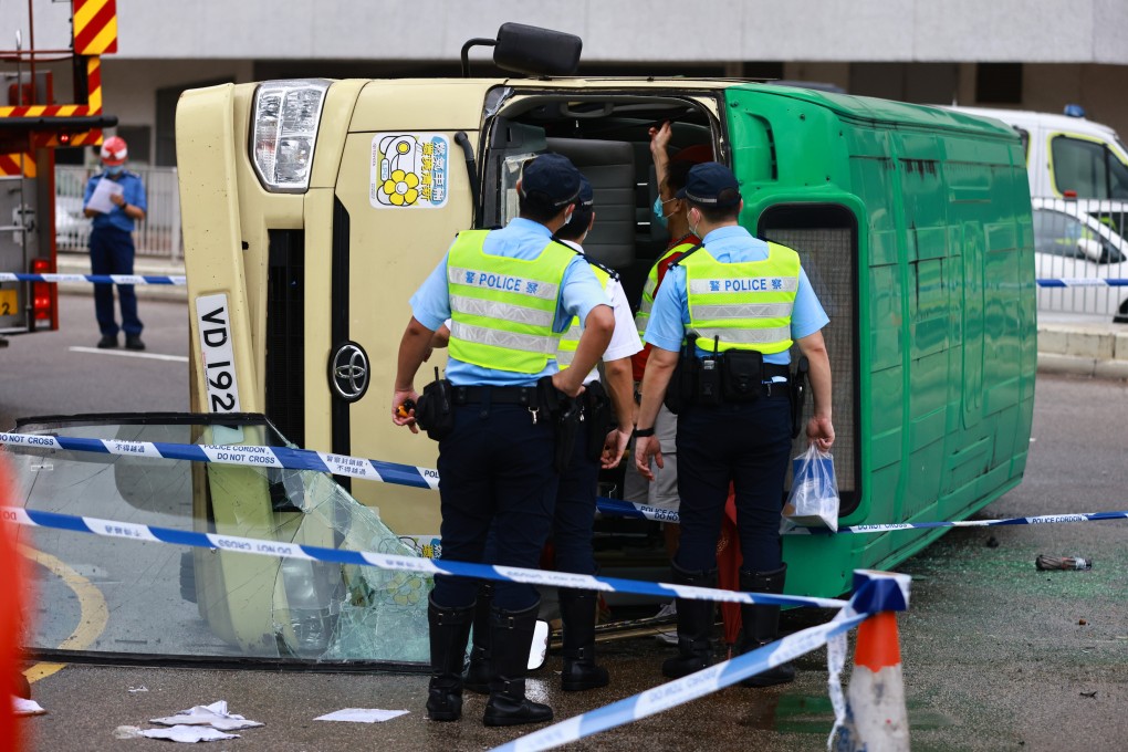 The Ma On Shan-bound route 803 minibus flipped on its side, smashing its windows and badly damaging the windscreen. Photo: May Tse