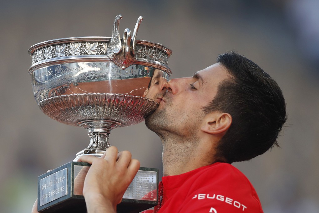 Serbia’s Novak Djokovic celebrates with his trophy after winning the French Open against Greece’s Stefanos Tsitsipas at Roland Garros stadium in Paris, France on Sunday. Photo: Reuters
