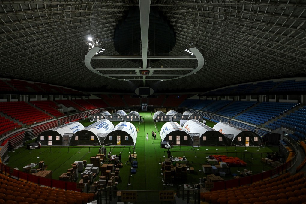 New mobile laboratories for nucleic acid testing have been set up inside Guangzhou Gymnasium, following the recent outbreak of the coronavirus disease in Guangzhou, Guangdong province. Photo: Reuters