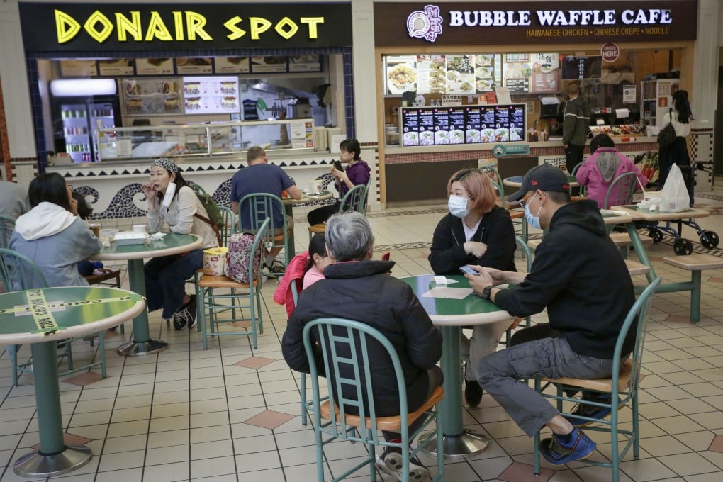 People dine in the food court of Lansdowne shopping centre in Richmond, British Columbia on May 26. Photo: Xinhua