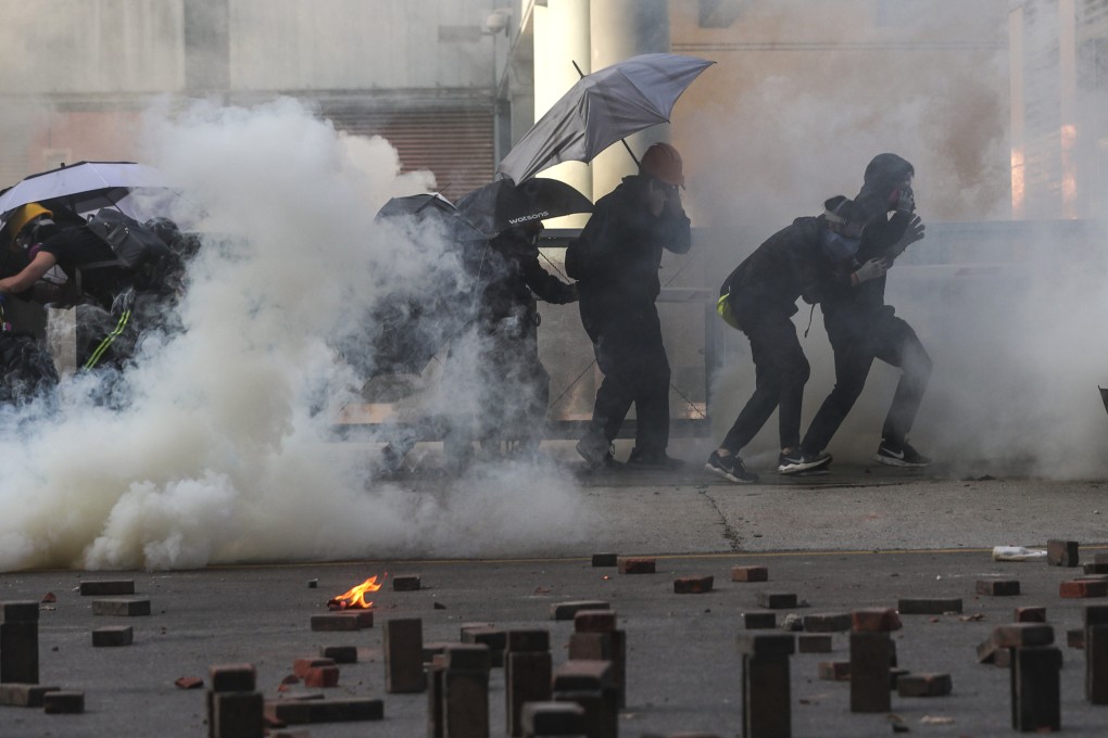 Clashes break out for a second day between riot police and anti-government protesters at Polytechnic University in 2019. Photo: Sam Tsang