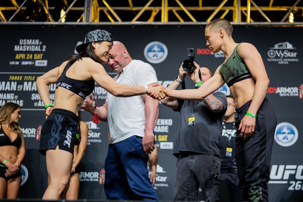 Zhang Weili and Rose Namajunas shake hands at the UFC 261 weigh-in. Photo: Zuffa LLC