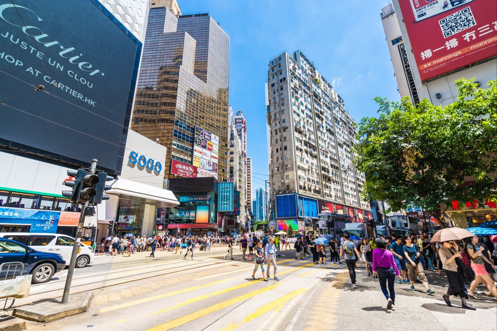 People crossing a busy street in Causeway Bay, Hong Kong. Photo: Shutterstocks