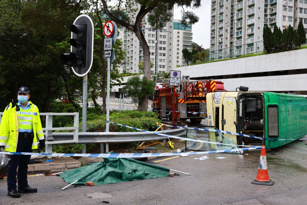 A minibus lying on its side after a crash with a car in Sha Tin. Photo: May Tse