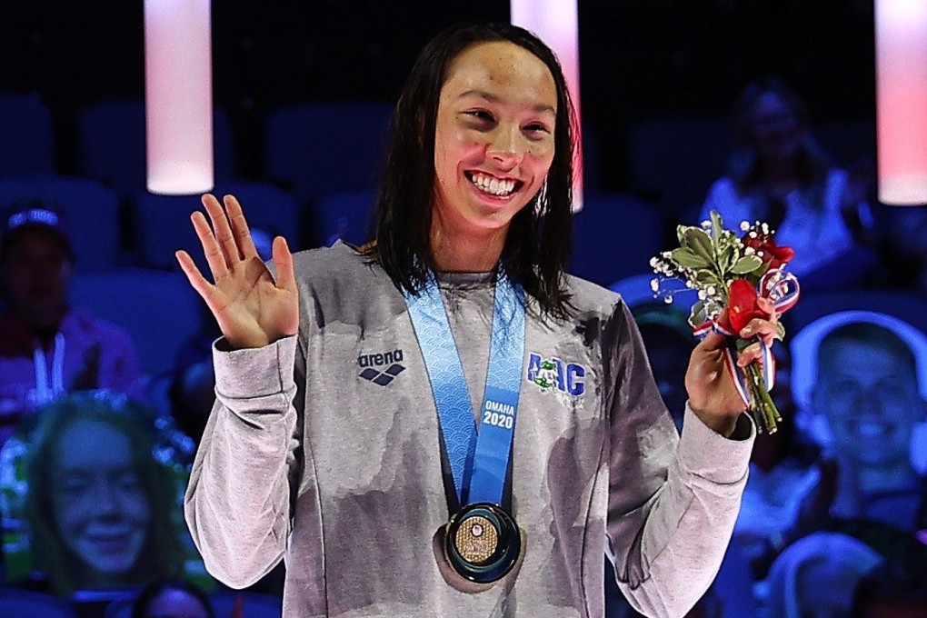 Torri Huske on the podium after winning gold in the women’s 100m butterfly at the 2021 US Olympic Team trials in Omaha, Nebraska. Photo: AFP