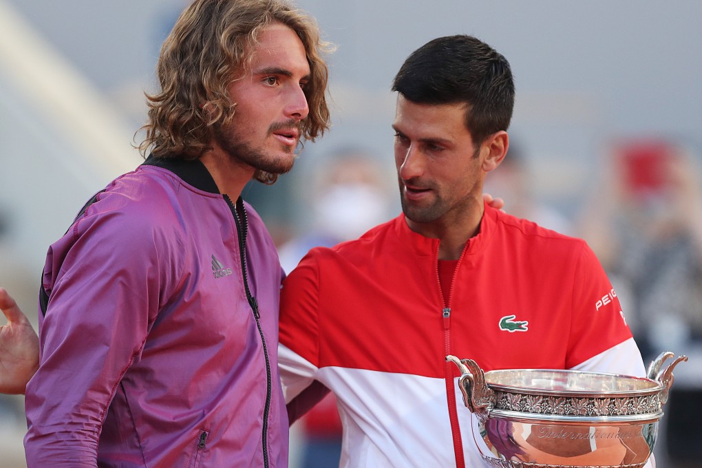 Sefanos Tsitsipas, of Greece, and Novak Djokovic, of Serbia, after the men’s singles final at the 2021 French Open. Photo: Xinhua