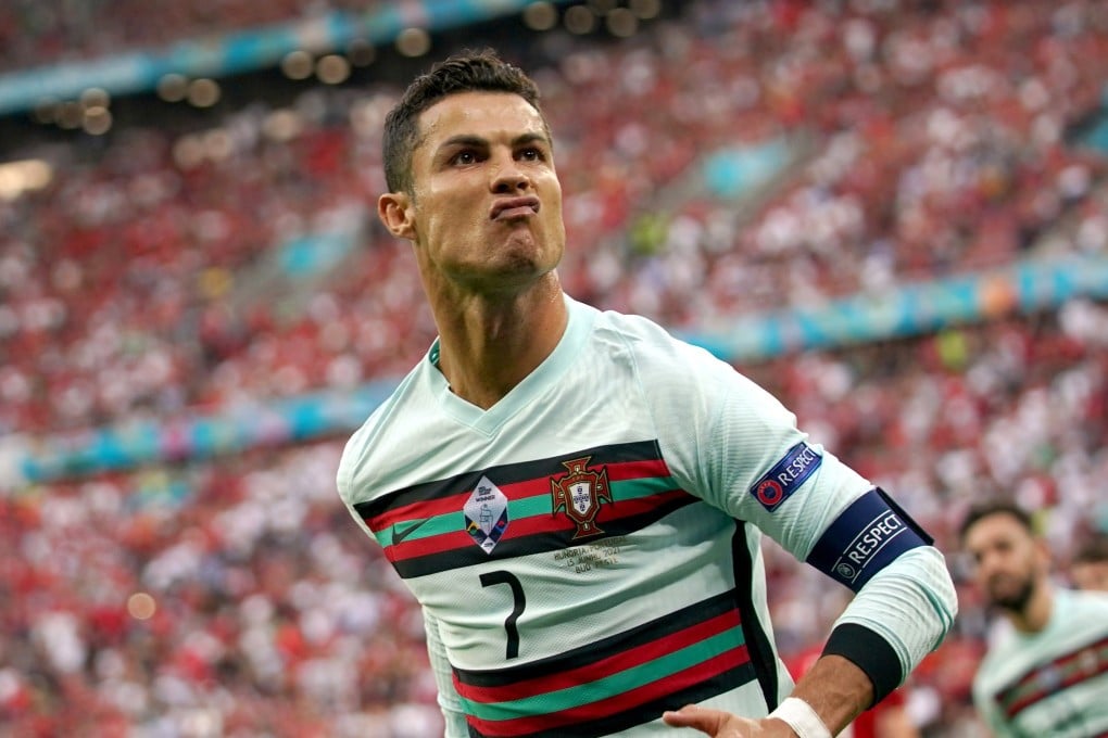 Cristiano Ronaldo of Portugal celebrates scoring his teamās second goal during the Uefa Euro 2020 win over Hungary. Photo: EPA