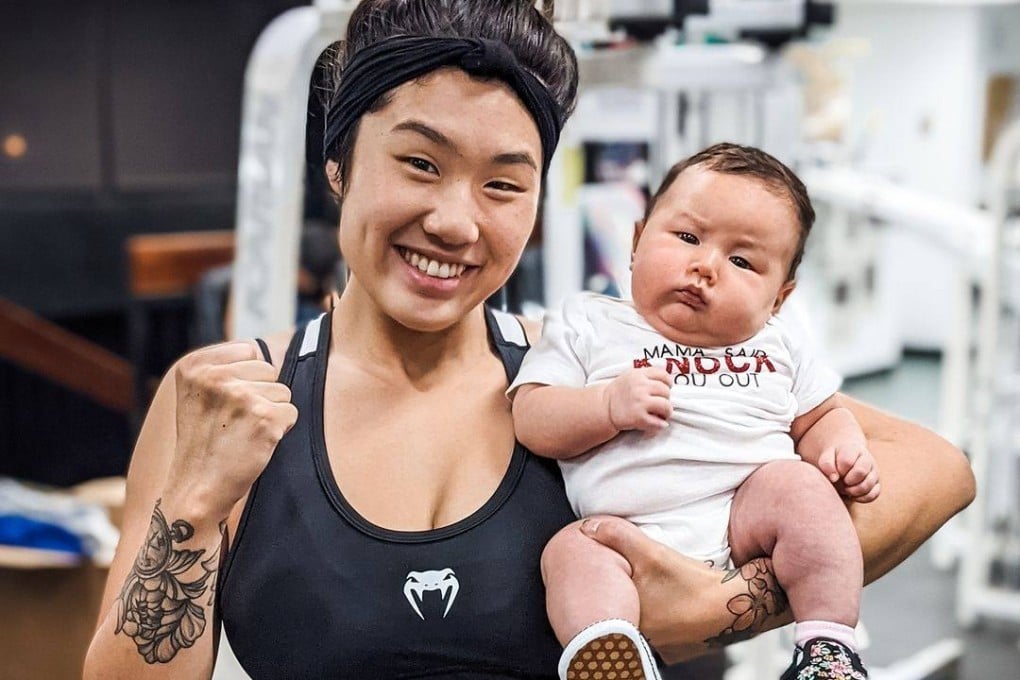 Angela Lee poses with her baby daughter after training for the first time since giving birth in April. Photos: Instagram/@angelaleemma