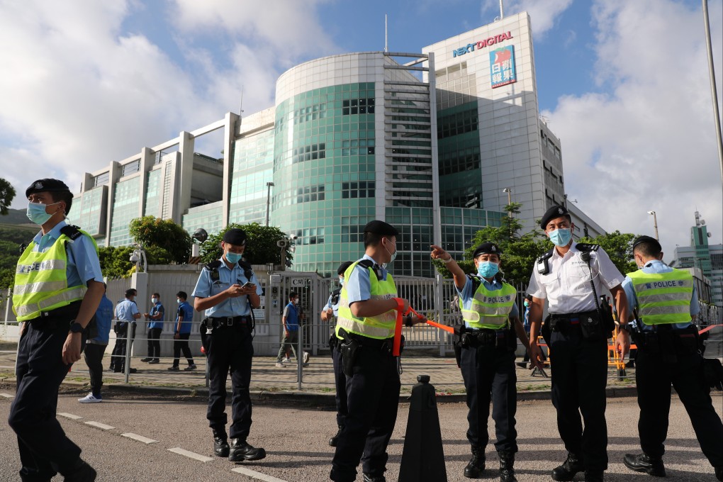 Police surround the offices of the Apple Daily newspaper in Tseung Kwan O. Photo: Sam Tsang