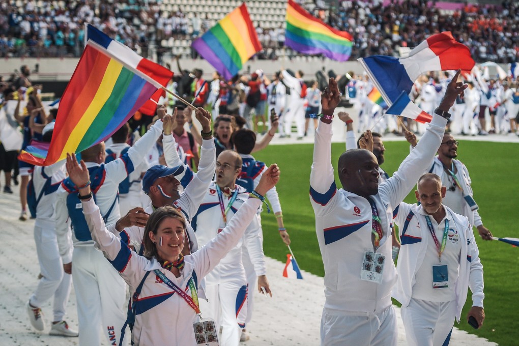 The French team march onto the field during the opening ceremony of the 2018 Gay Games at the Jean Bouin Stadium in Paris on August 4 that year.  The Hong Kong edition in 2022 will feature 36 sporting events, expected to attract 12,000 participants and 75,000 spectators, and generate about HK$1billion in the local economy. Photo: AFP