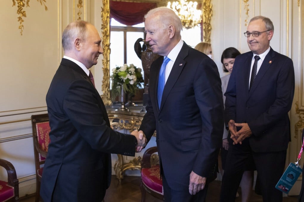 Russian President Vladimir Putin and US President Joe Biden shake hands in Geneva on Wednesday. Photo: EPA-EFE
