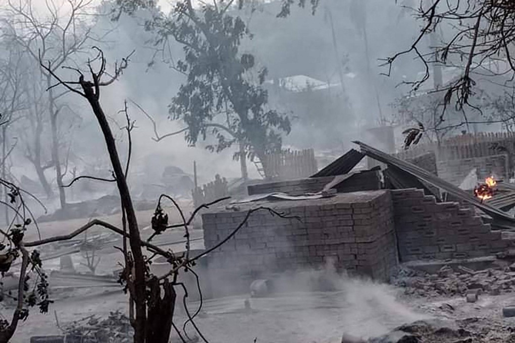 The remains of burnt houses in Kin Ma village, Pauk township in Myanmar on Wednesday. Photo: AFP / Pauk Township News