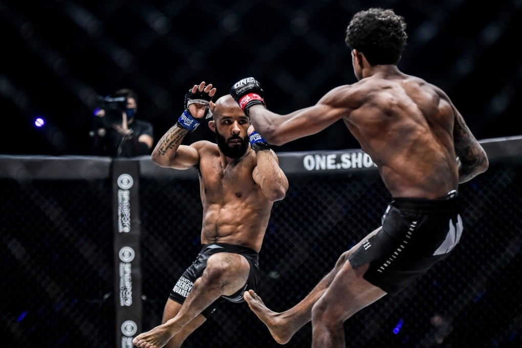 Demetrious Johnson looks to avoid a leg kick by Adriano Moraes. Photos: ONE Championship