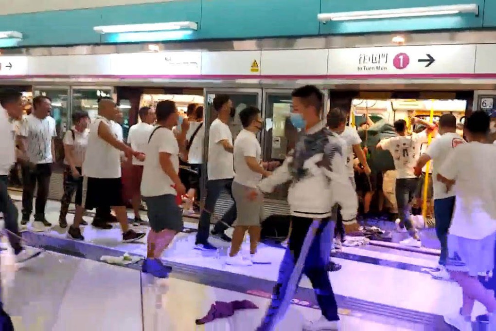 A mob of men in white T-shirts attacked protesters and passengers at Yuen Long MTR station. Photo: Handout