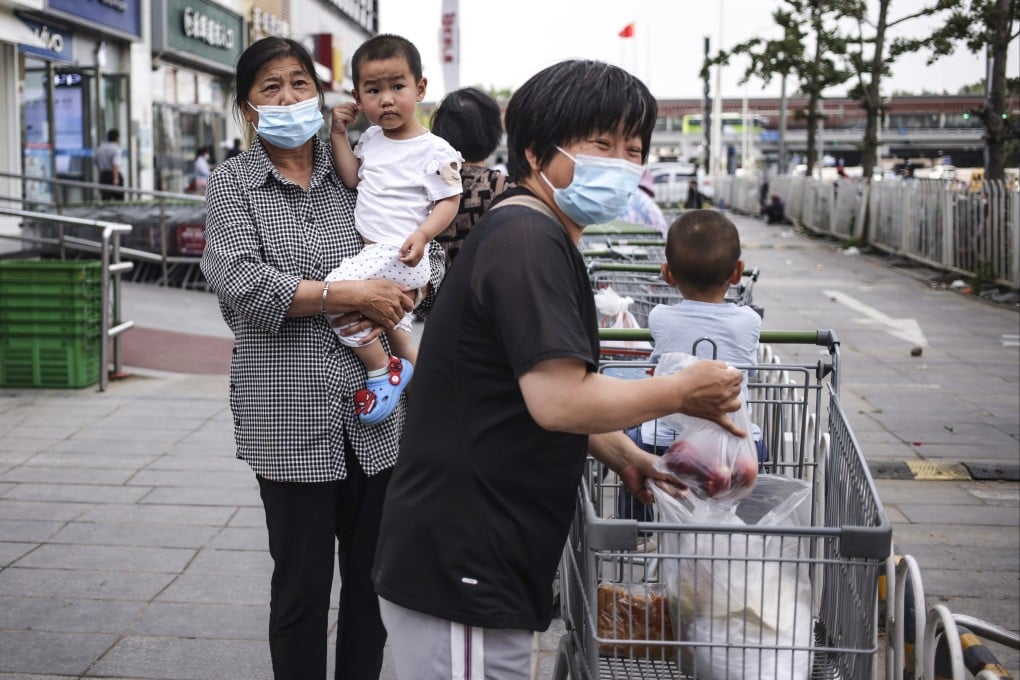 High housing and education costs mean some Chinese families are already struggling to have two children. Photo: EPA-EFE