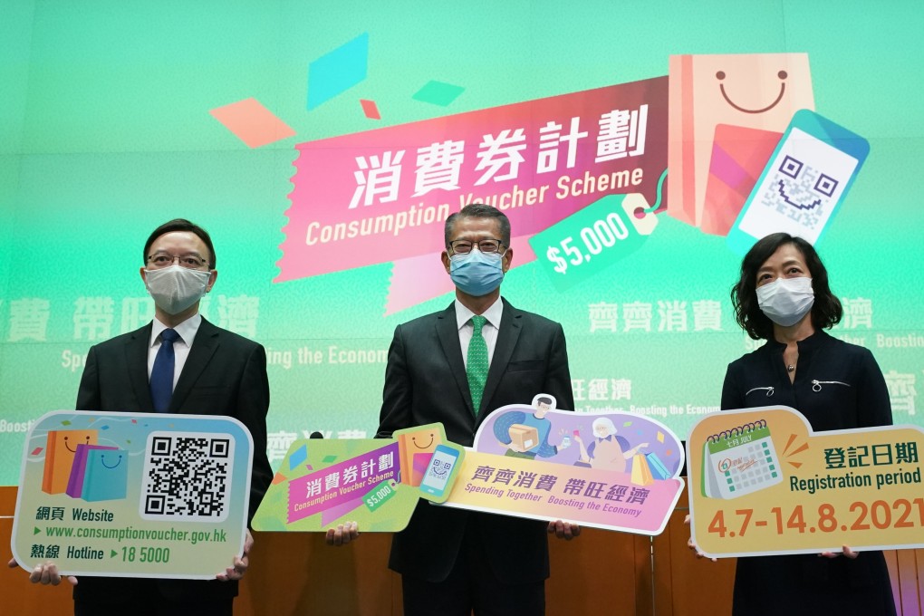 Paul Chan, financial secretary, holds a press conference to announce details of the Consumption Voucher Scheme in the  Central Government Offices, Tamar, on Friday. Photo: Felix Wong