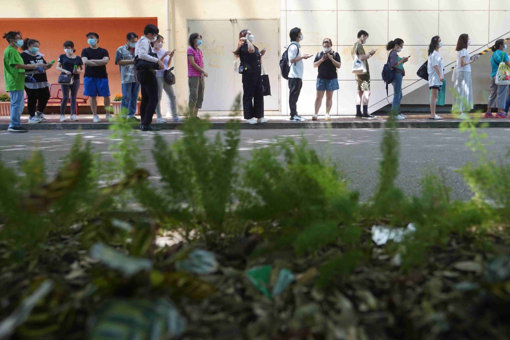 Hong Kong residents queue for BioNTech jabs on Wednesday. Photo: Winson Wong