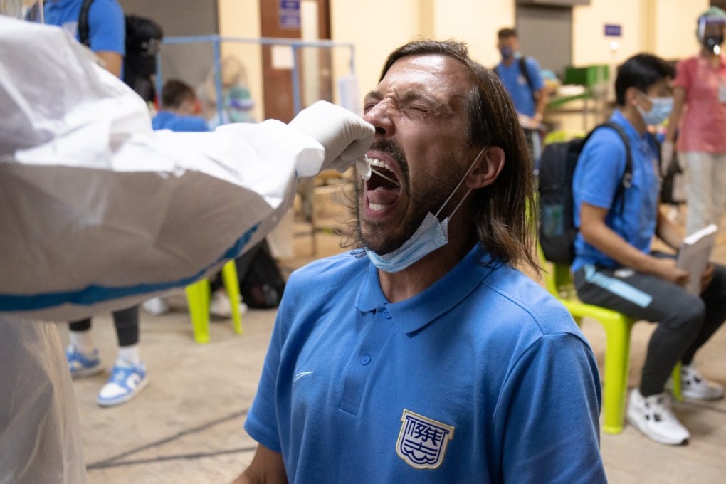 Kitchee striker Dejan Damjanovic takes a Covid-19 test upon arrival in Bangkok on Sunday. Photo: Kitchee