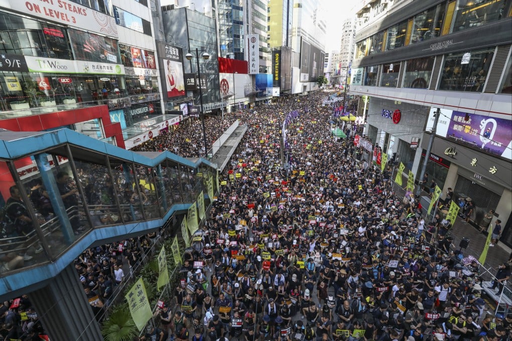 Protesters march from Victoria Park in Causeway Bay to the Legislative Council complex during a July 1 rally organised by the Civil Human Rights Front in 2019. Photo: Dickson Lee