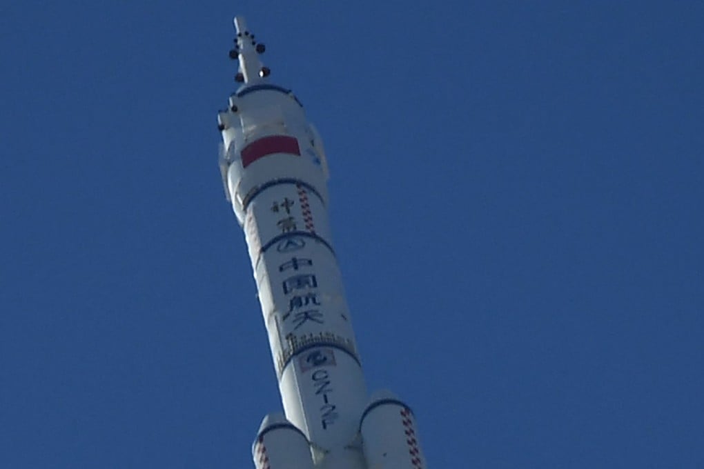 A Long March-2F carrier rocket, carrying the Shenzhou-12 spacecraft and a crew of three astronauts, lifts off from the Jiuquan Satellite Launch Centre in the Gobi Desert in northwest China on June 17, 2021. Photo: AFP
