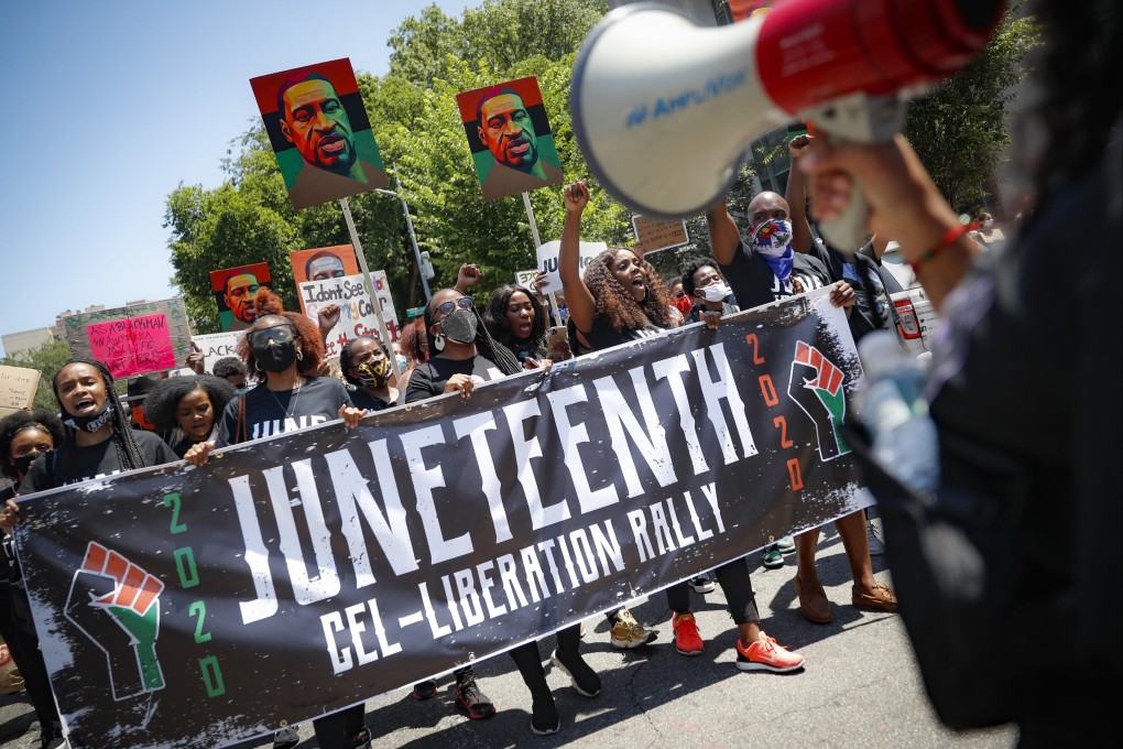 Protesters chant as they march after a Juneteenth rally at the Brooklyn Museum in New York on June 19, 2020. Photo: AP