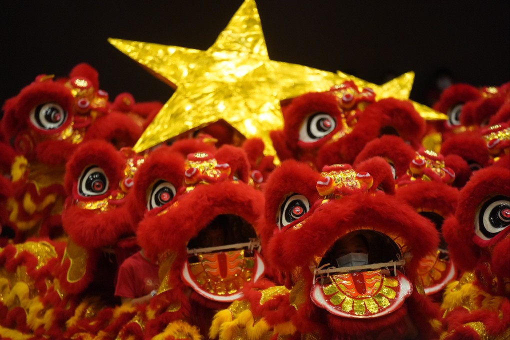 Red lions dance at the headquarters of the Heung Yee Kuk, an influential Hong Kong rural body, in Sha Tin on June 20, ahead of the 100th anniversary of the founding of the Communist Party of China in July. Photo: Sam Tsang