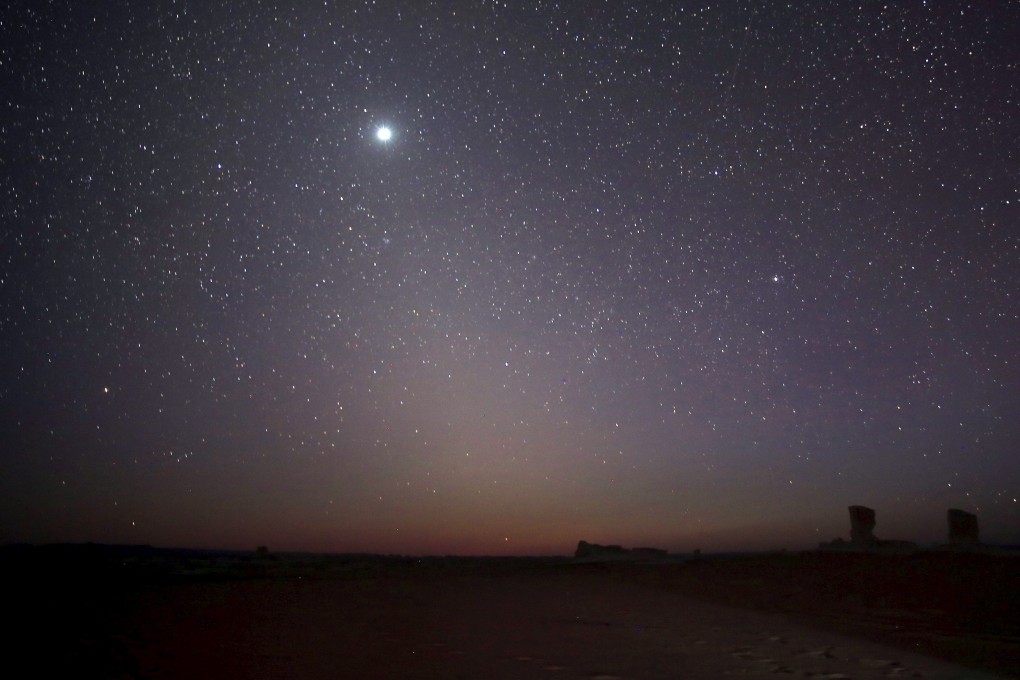 The planet Venus is seen in the night sky over rocks in the White Desert southwest of Cairo on May 15, 2015. A Pentagon task force recently reviewed 120 sightings of unidentified aerial phenomena. Photo: Reuters